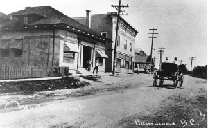 Maple Crescent, Port Hammond. The nearest building was constructed as the Bank of Hamilton in 1911; it is now a shop catering to motorcycle enthusiasts. The second building collapsed from neglect in 2009. Photo courtesy MR Museum P00227