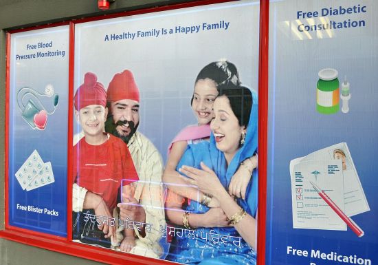 Drug store window, South Fraser Street